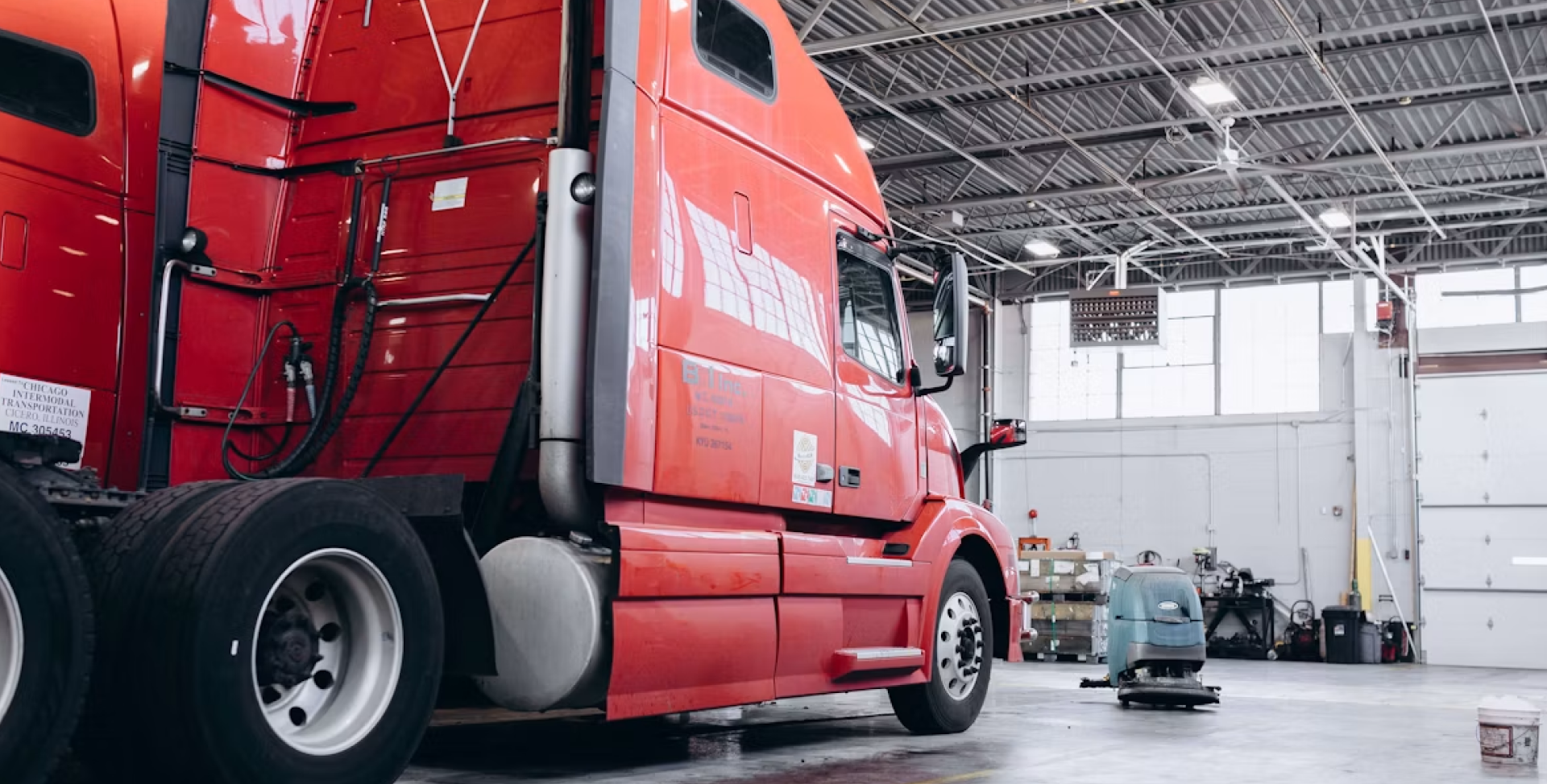 Mechanic inspecting a heavy vehicle wheel
